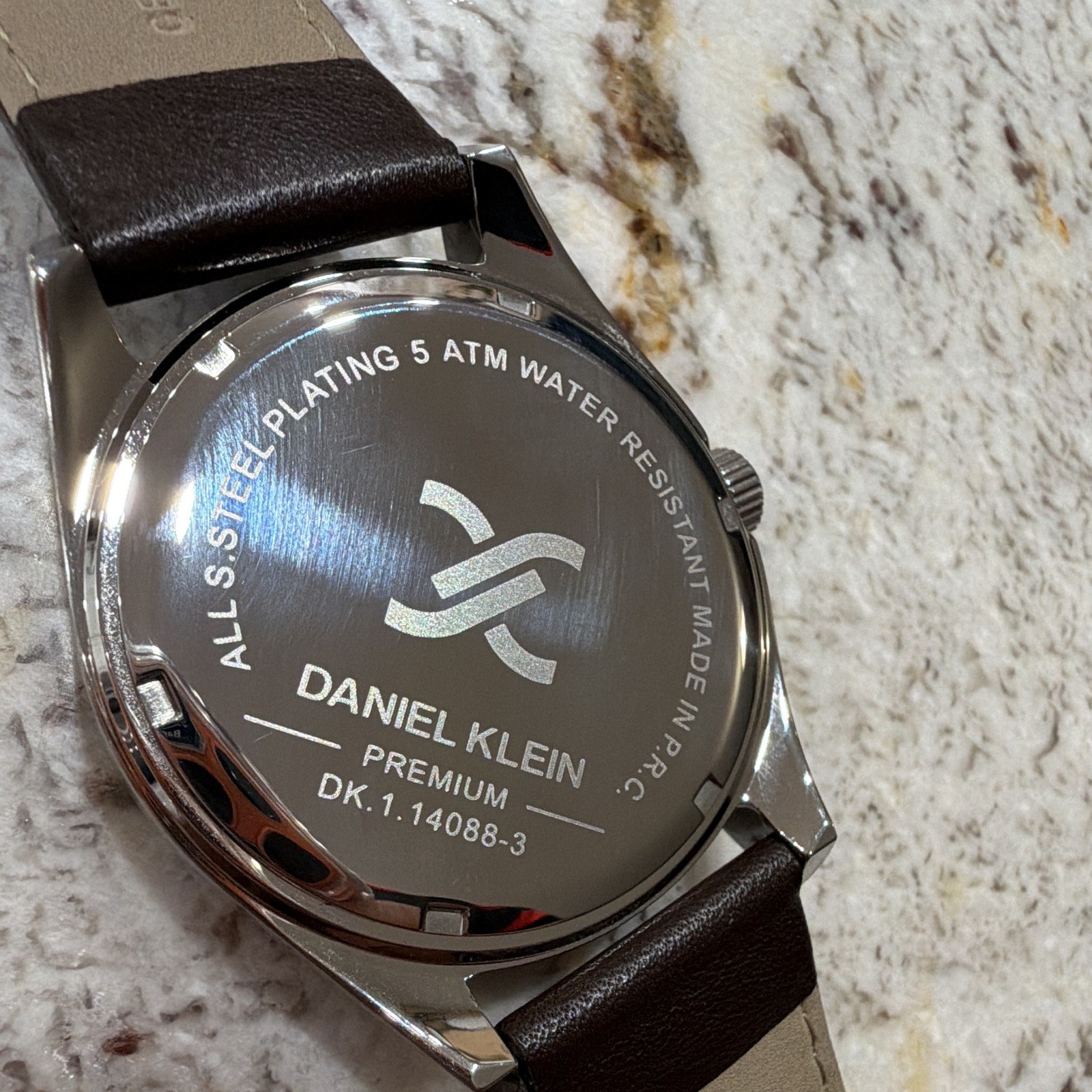 Daniel Klein Premium Blue Textured Dial Day/Date Quartz Brown Leather 5 ATM