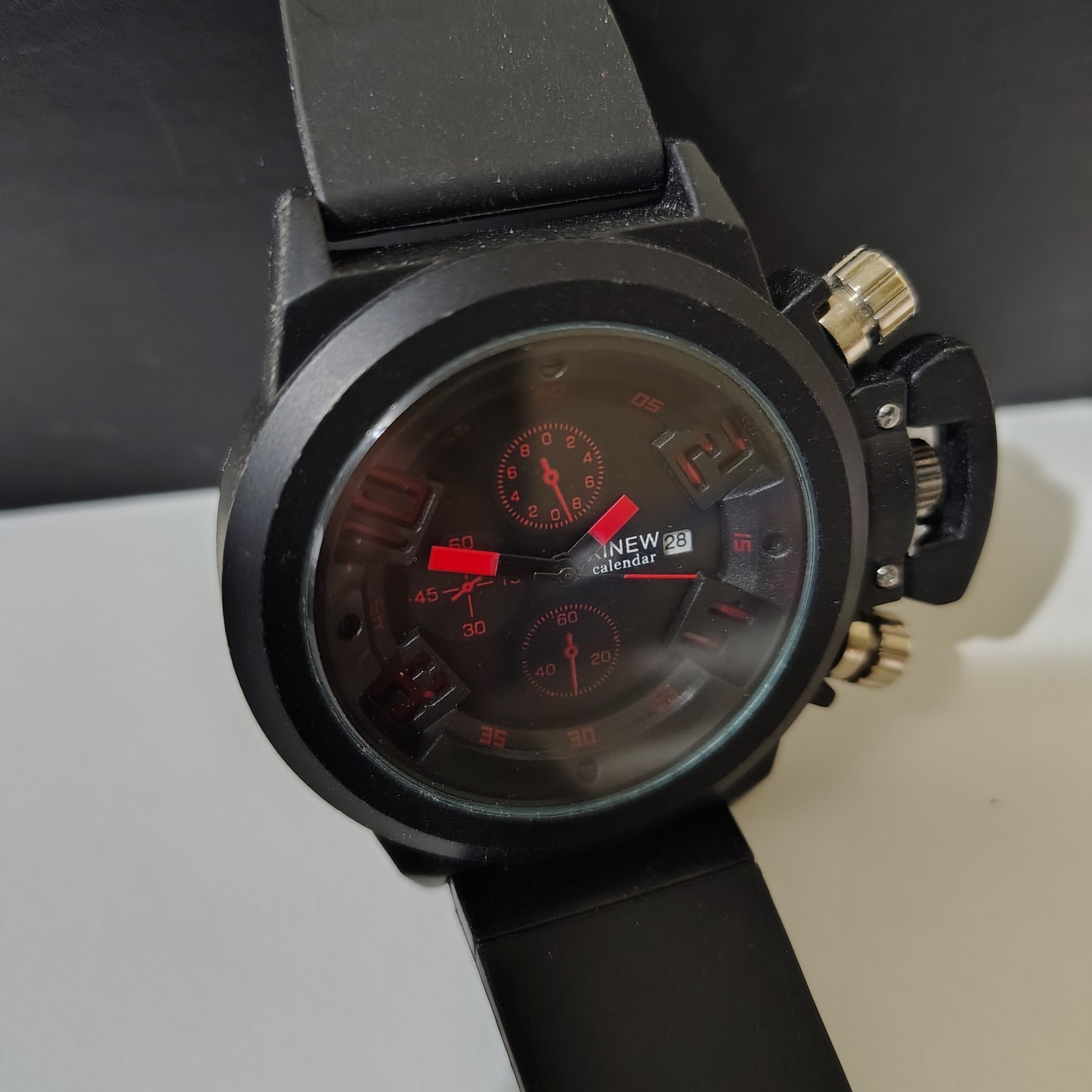 XINEW Mens watch Black Dial Date Quartz Japan Movt unique modern look