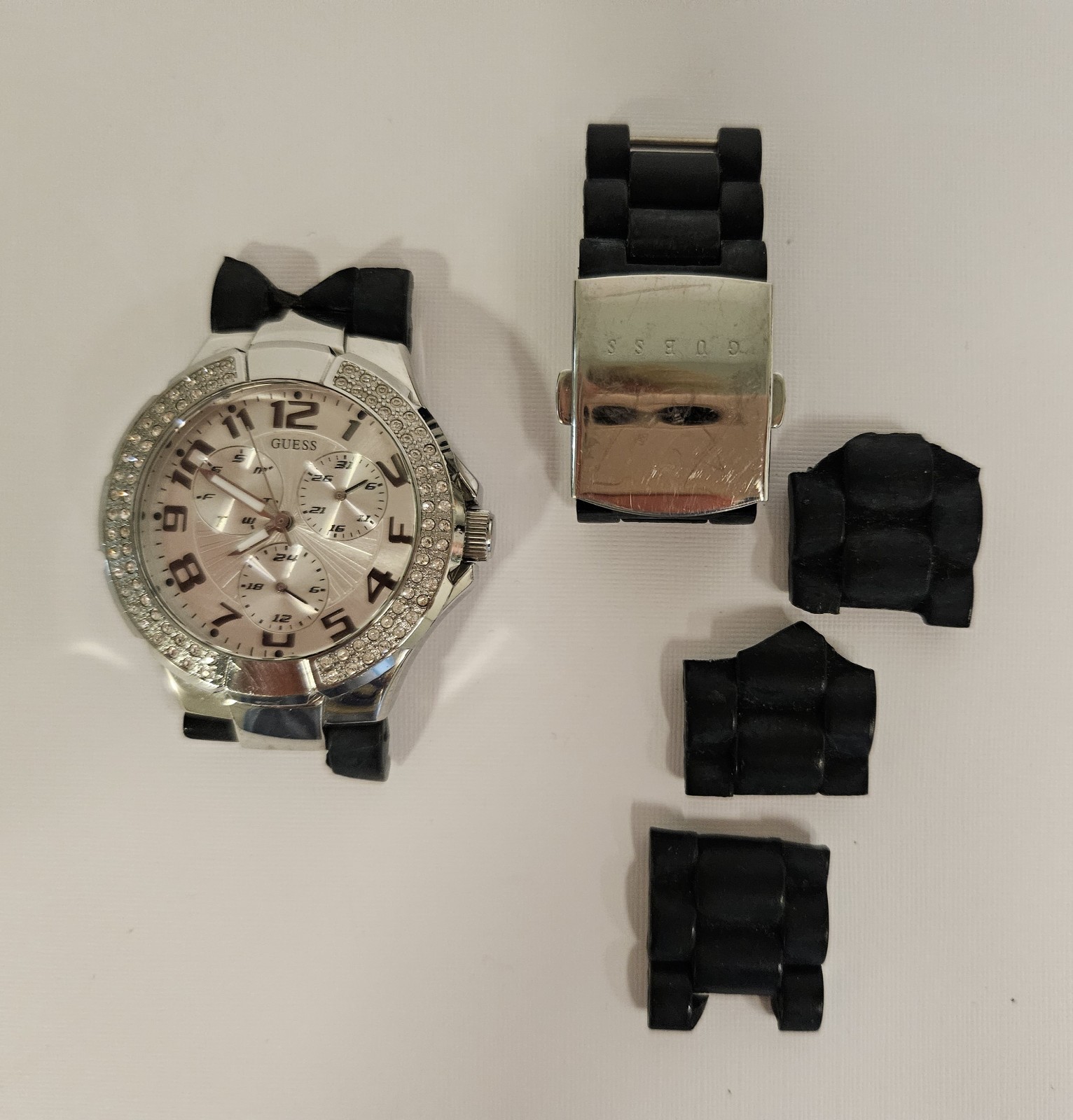 GUESS Women’s Analog Quartz Watch 100m Silver Dial Gem Bezel Black Rubber