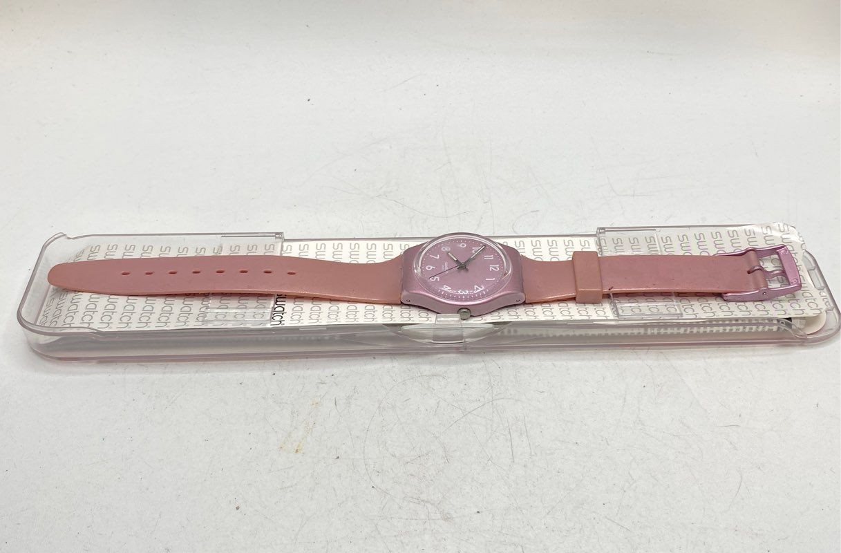 Swatch Women’s Pink Shimmer Quartz Watch 34mm Plastic Case Rubber Band With Box