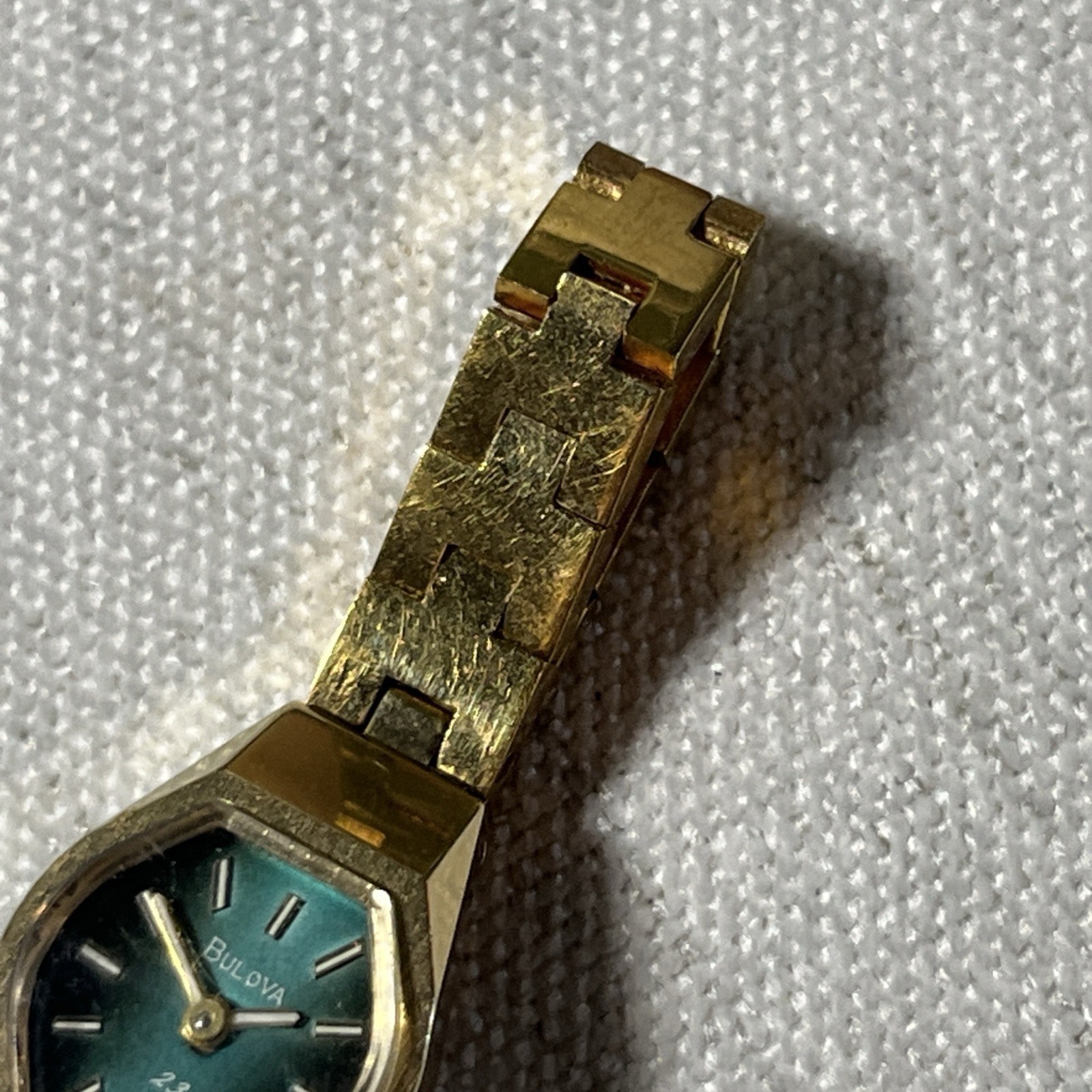 Ladies 16mm Bulova 23J Gold Tone Manual Wind Watch Green Dial 6 1/4” Running