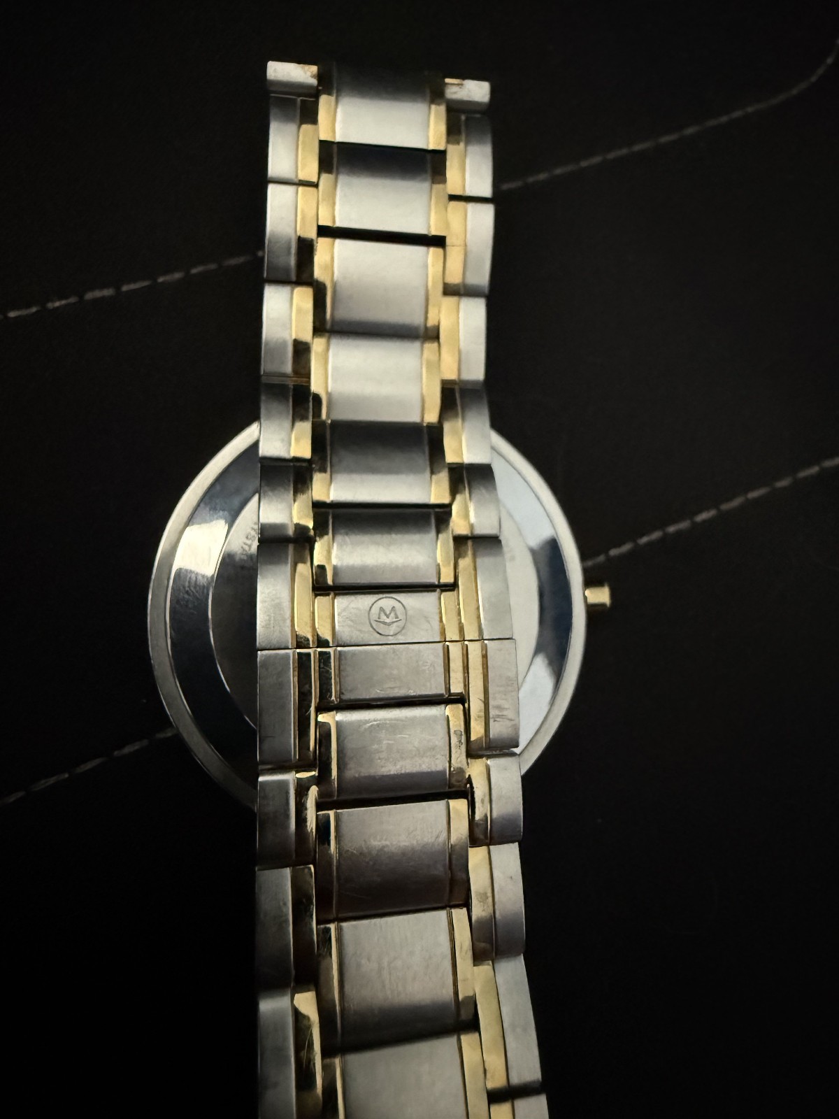 Used Movado Stiri Yellow Gold Two Tone Black Dial Watch.