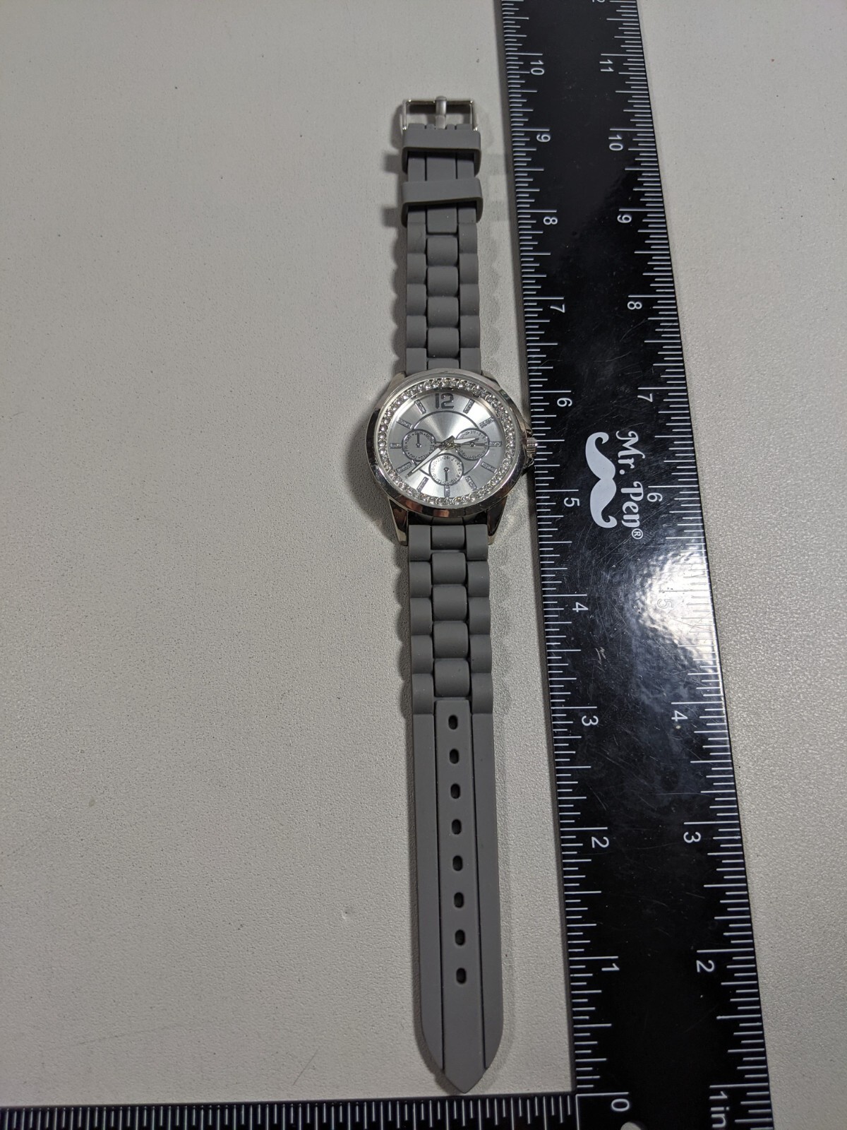 Silver Tone Dial Round Crystal Accent Case38 mm Gray Rubber Band Watch