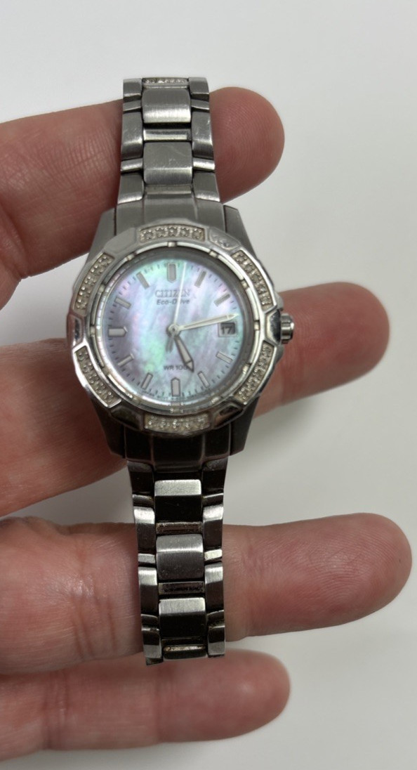 Citizen Eco-Drive Women’s Pink Mother Of Pearl Date Silver Stainless Watch WR100