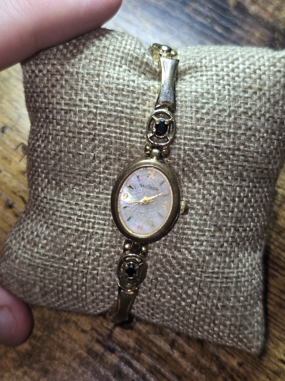 LADIES’ WALTHAM WATCH WITH MOTHER OF PEARL FACE DIAL NO BATTERY GOLD TONE