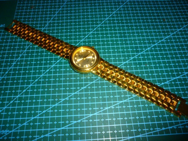 UNISEX SWISS MADE 18K GOLD PLATED SWISTAR DRESS WRISTWATCH NEW WITHOUT TAGS.
