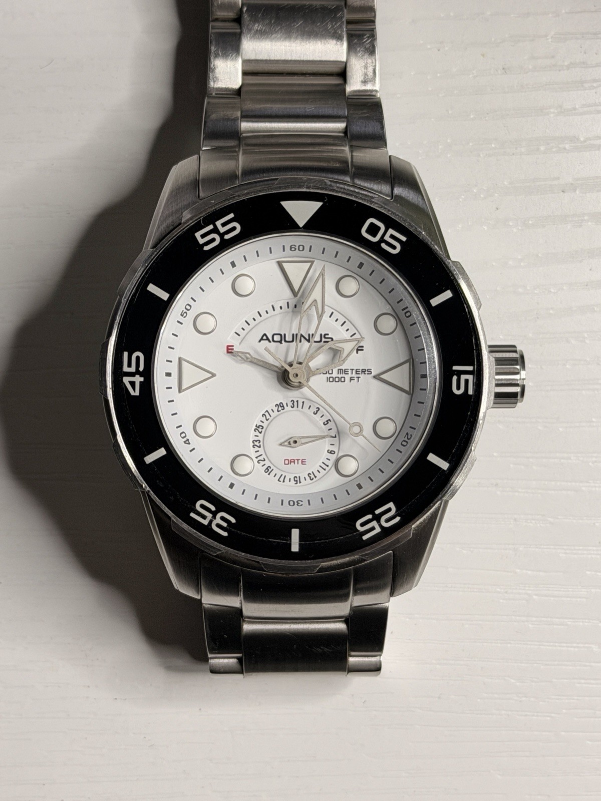 Aquinus Men’s Diver Quartz Date White Dial Black Bezel Steel Watch 300m