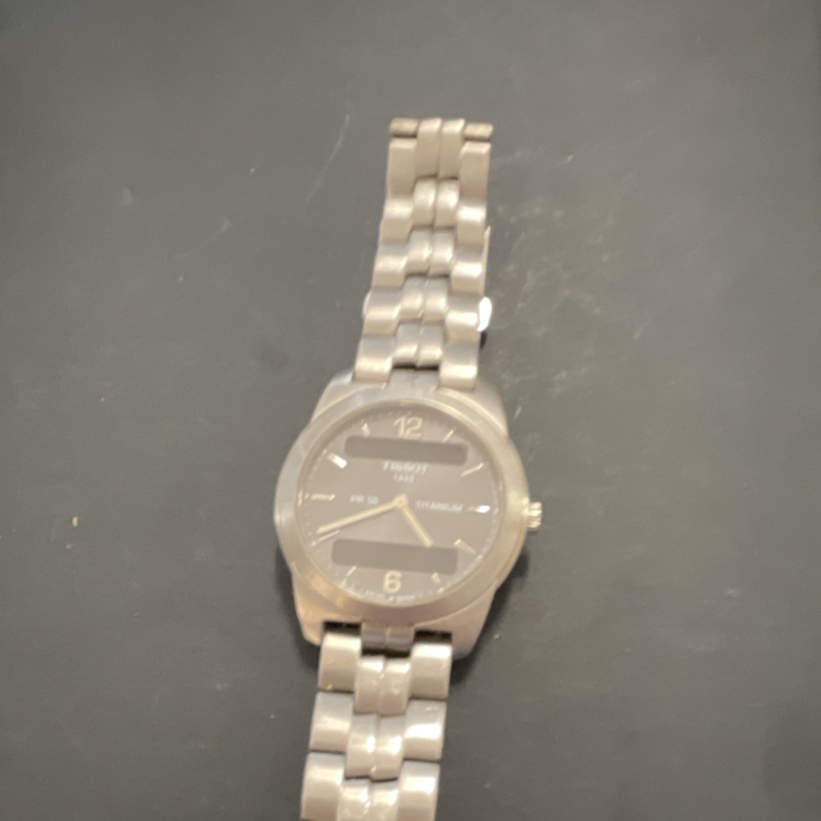 Tissot Men’s Silver Titanium Band Analog Wristwatch Gray Dial Baton Indexes