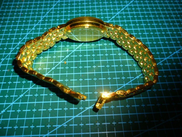 UNISEX SWISS MADE 18K GOLD PLATED SWISTAR DRESS WRISTWATCH NEW WITHOUT TAGS.