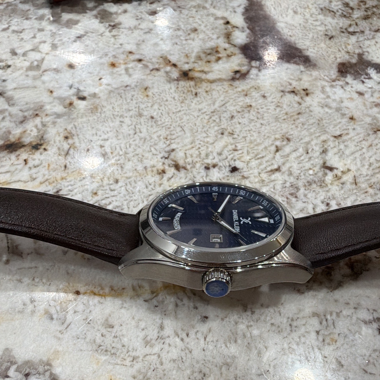 Daniel Klein Premium Blue Textured Dial Day/Date Quartz Brown Leather 5 ATM