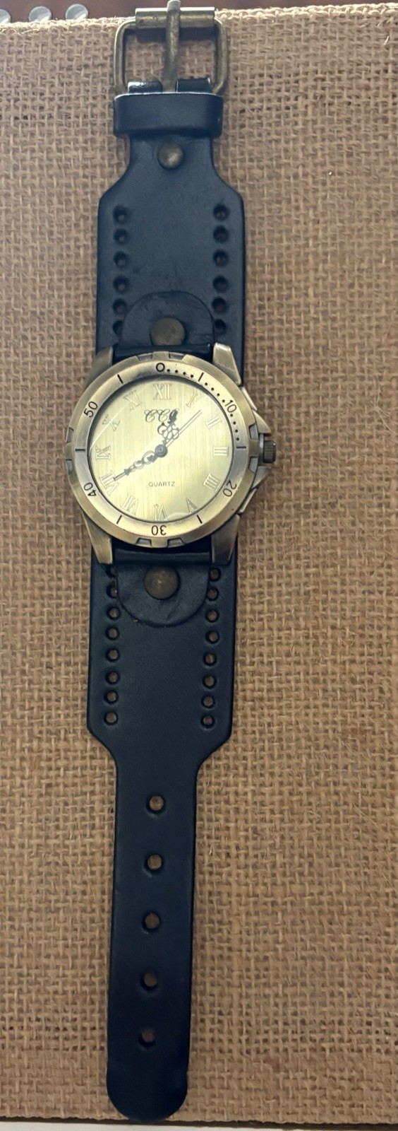 Quartz Gold Dial Roman Numeral Analog Watch Gold Case Black Leather Strap
