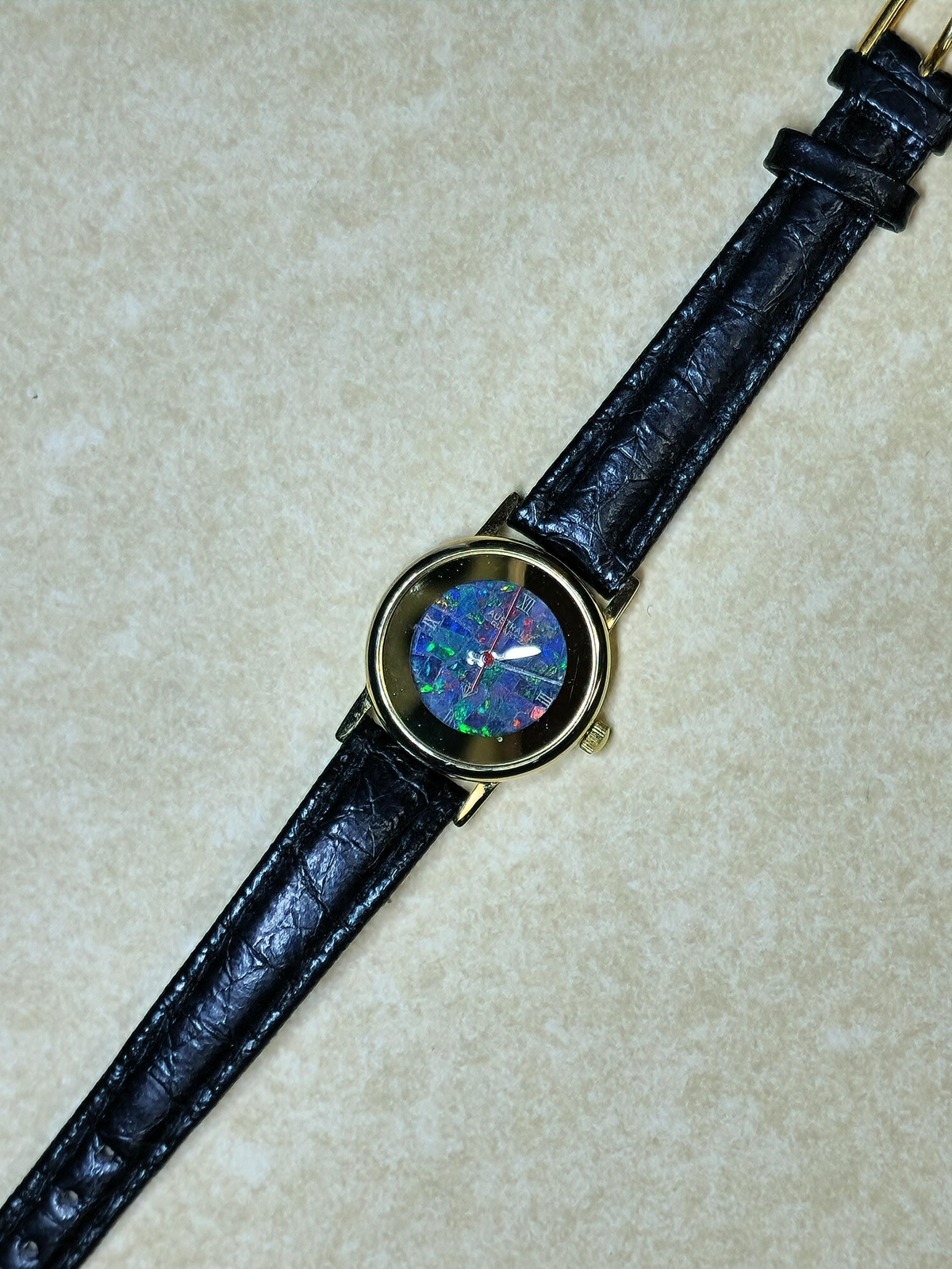 54181.0 – “Australia” Opal Watch with Natural Australian Opal Gold rim with no