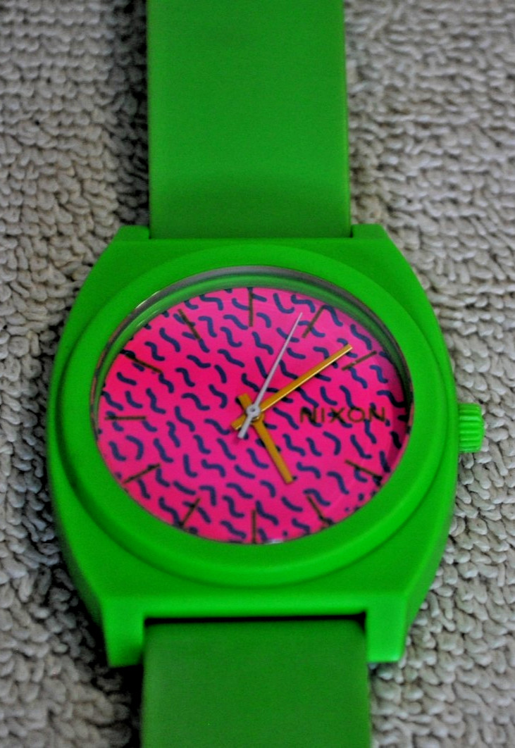 Nixon Time Teller P watch featuring a vibrant green polycarbonate case and strap