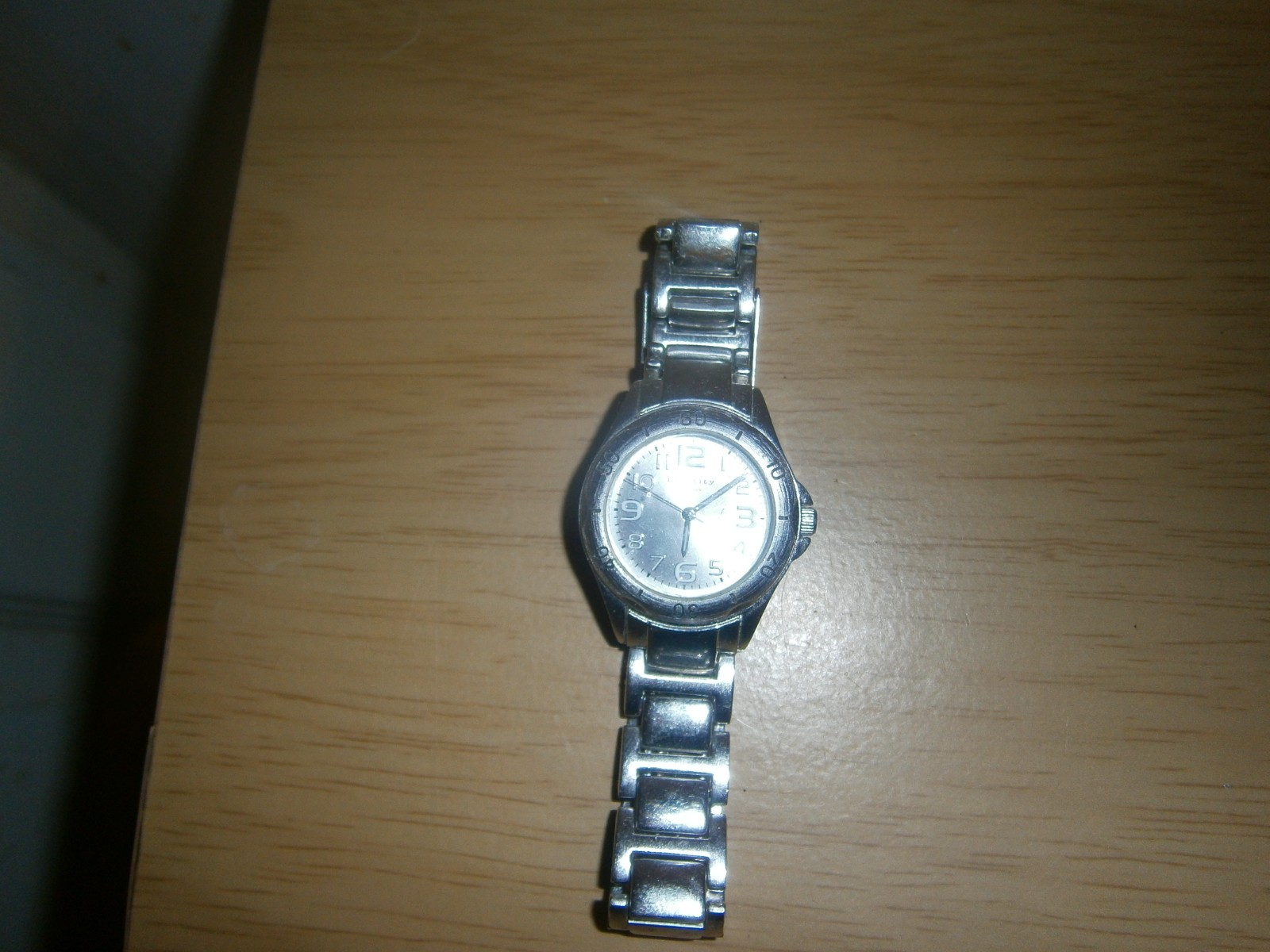 Late 2000’s silver tone ‘Identity London’ quartz watch. Folding clasp.(E24WB)