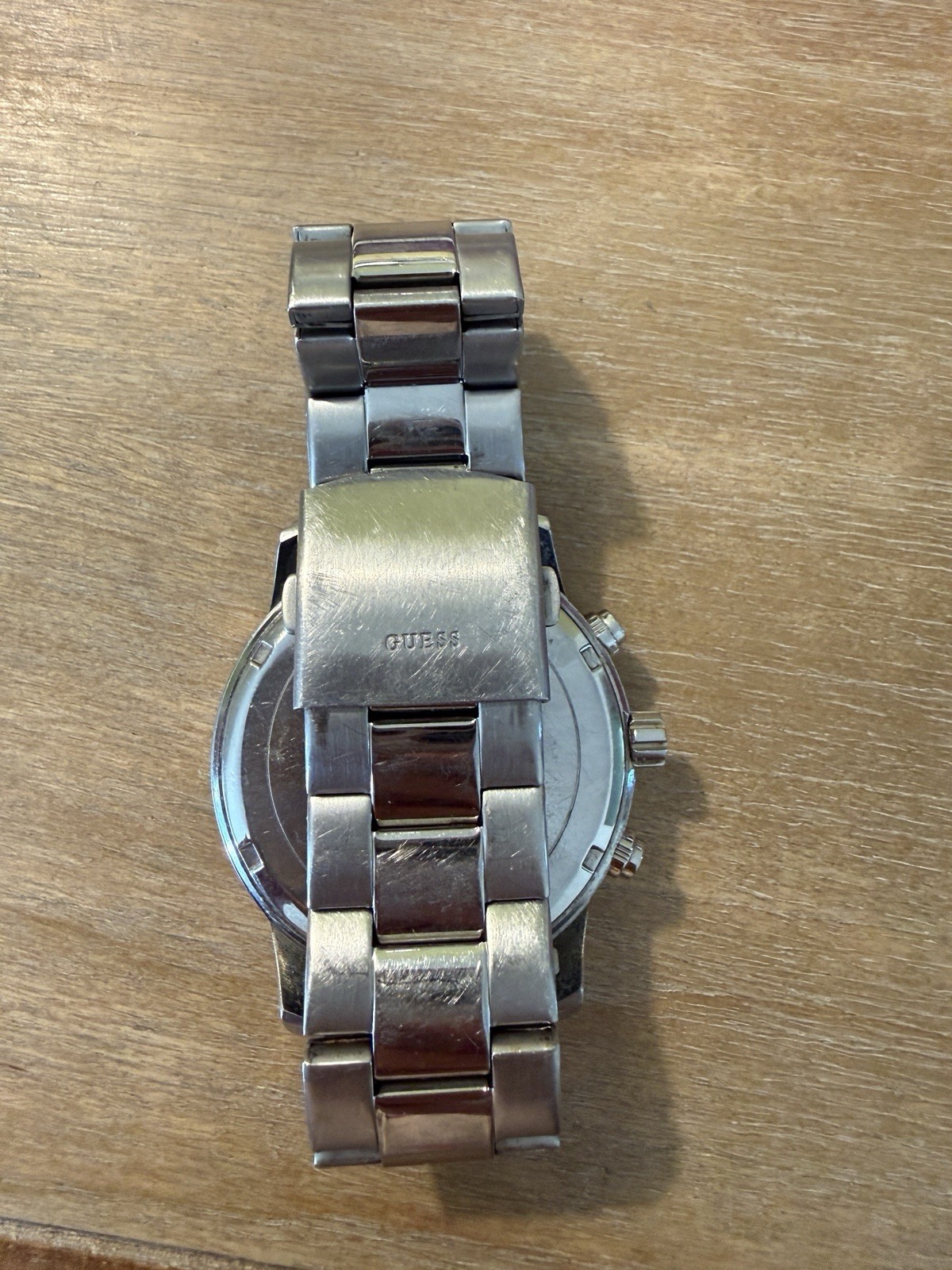 GUESS Men’s Silver Stainless Steel Watch. Needs a battery