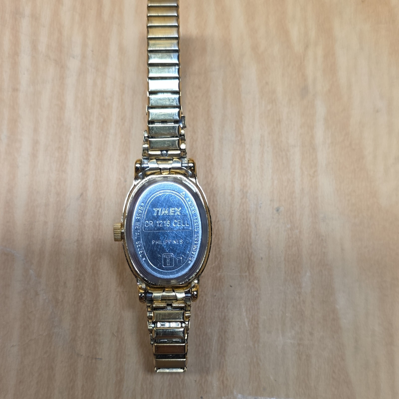 Timex Women Quartz Oval Analog Bracelet Watch Gold Tone Silver Arabic Dial