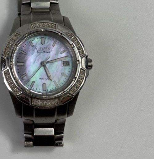 Citizen Eco-Drive Women’s Pink Mother Of Pearl Date Silver Stainless Watch WR100