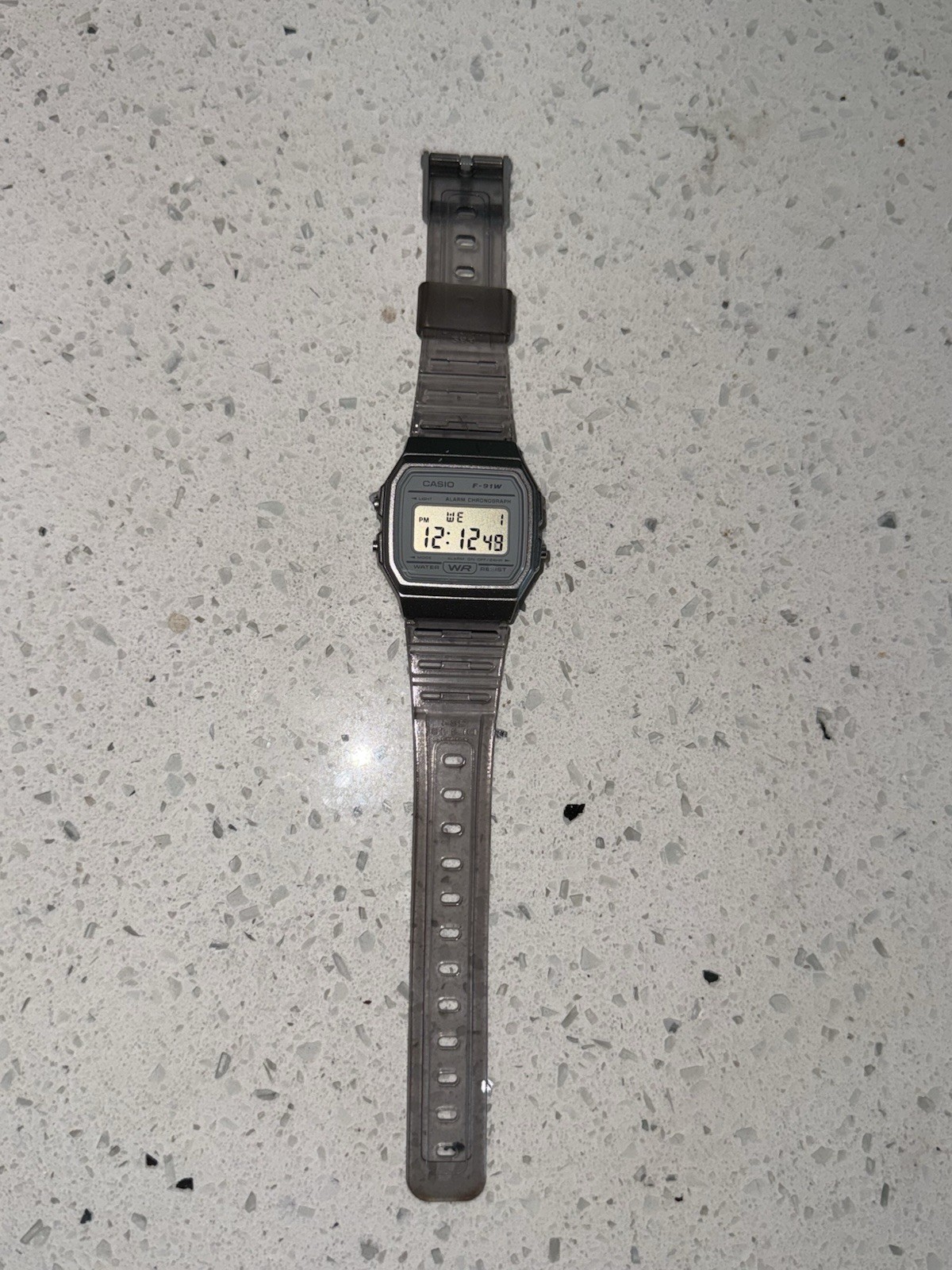 Casio F-91W Digital Quartz Watch Black Resin Case Gray/Clear Strap Alarm