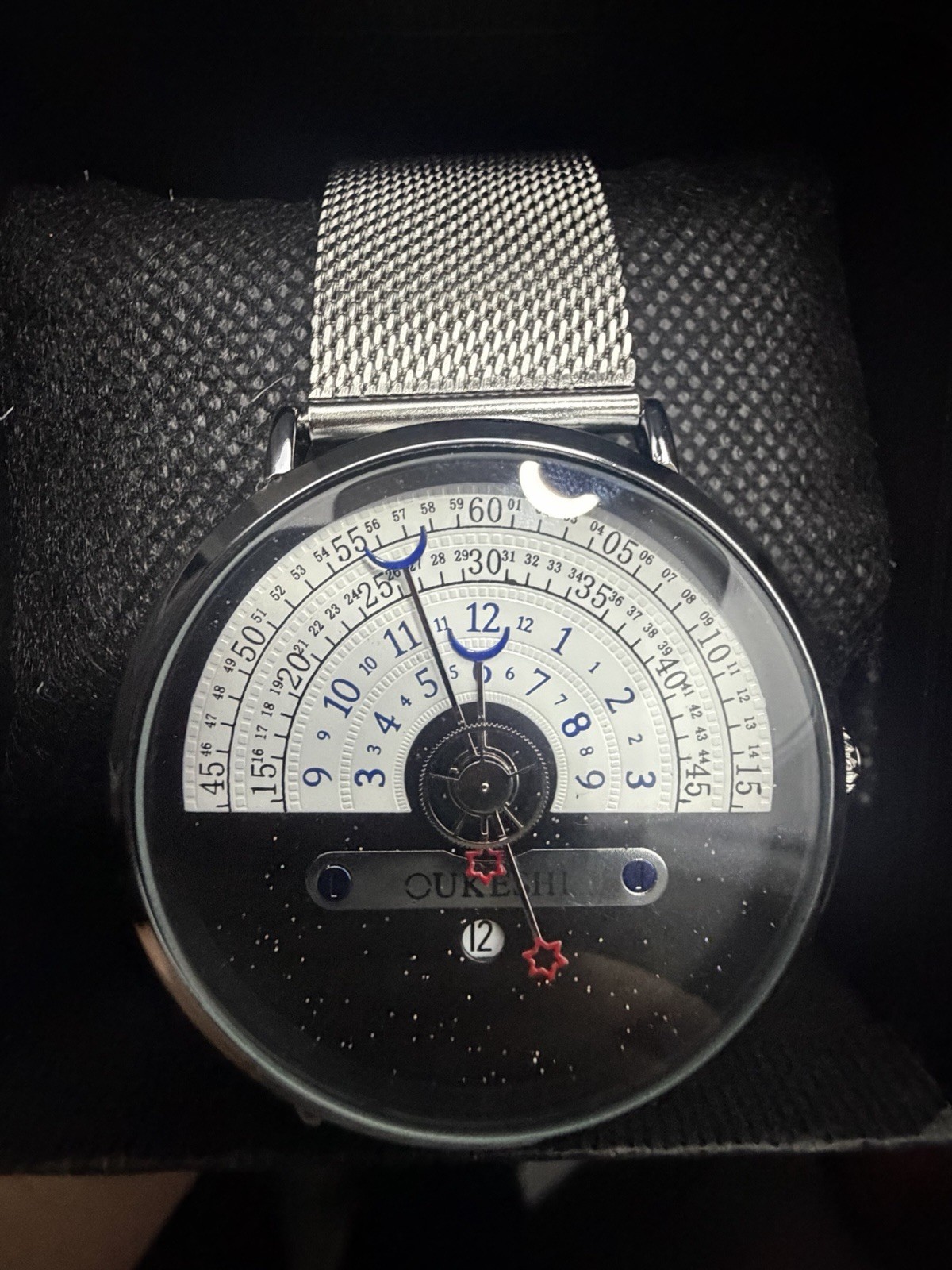 OUKESHI Orbit Dial Quartz Watch Mens Moon and Stars Pointer Steel Mesh Band