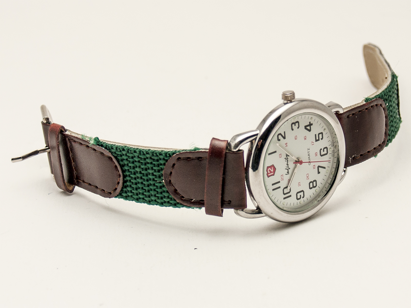 INFINITY:MENS GENUINE LEATHER/CANVAS BAND ROUND CASE ANALOG QUARTZ BATTERY WATCH