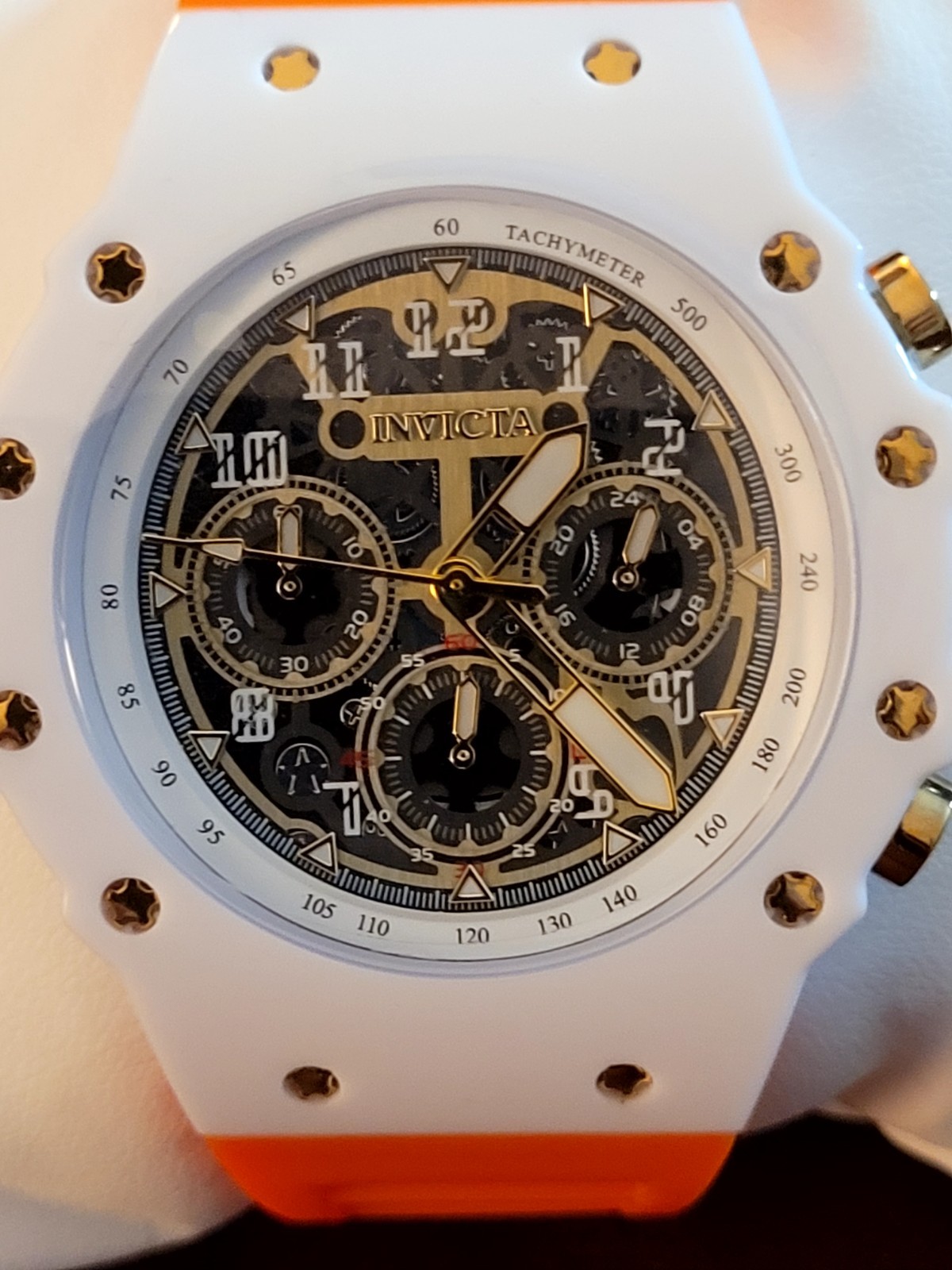 Invicta Men’s Chronograph Quartz Watch Tachymeter Black Dial Orange Strap Box