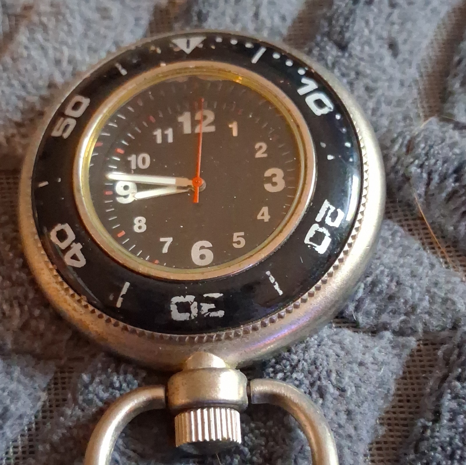 Analog Wristwatch Black Dial Arabic Numerals Black Bezel Silver Case Nylon Strap