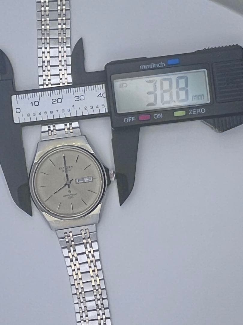 CITIZEN QUARTZ wristwatch, gold and silver case.