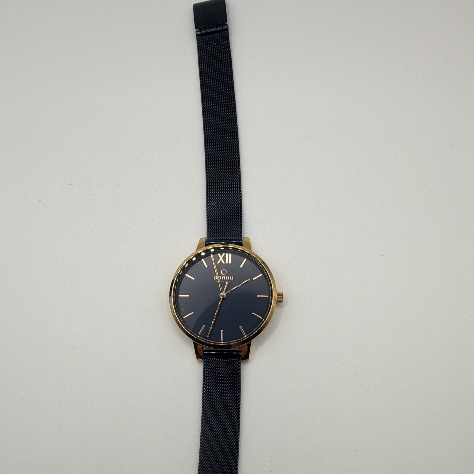 Obaku V209LXVLML Quartz Dress Watch Blue Dial Gold Case Black Mesh Bracelet