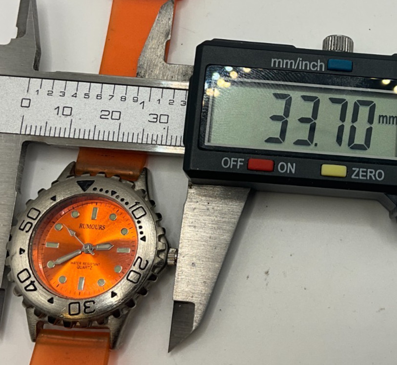 Rarely worn if ever, Rumours womens dive style watch, bold model, new battery