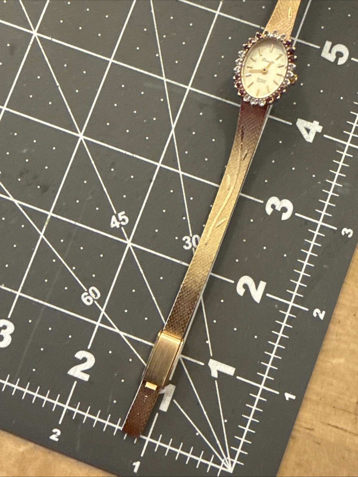 24 diamond ruby Deauville Ladies watch gold plate band new battery