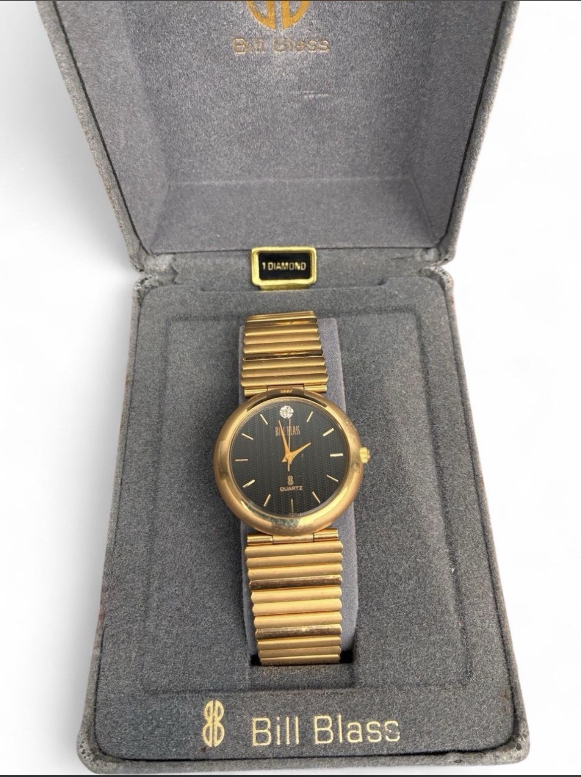 Bill Blass Womens Quartz Dress Watch Gold Tone Bracelet Black Textured Dial Box