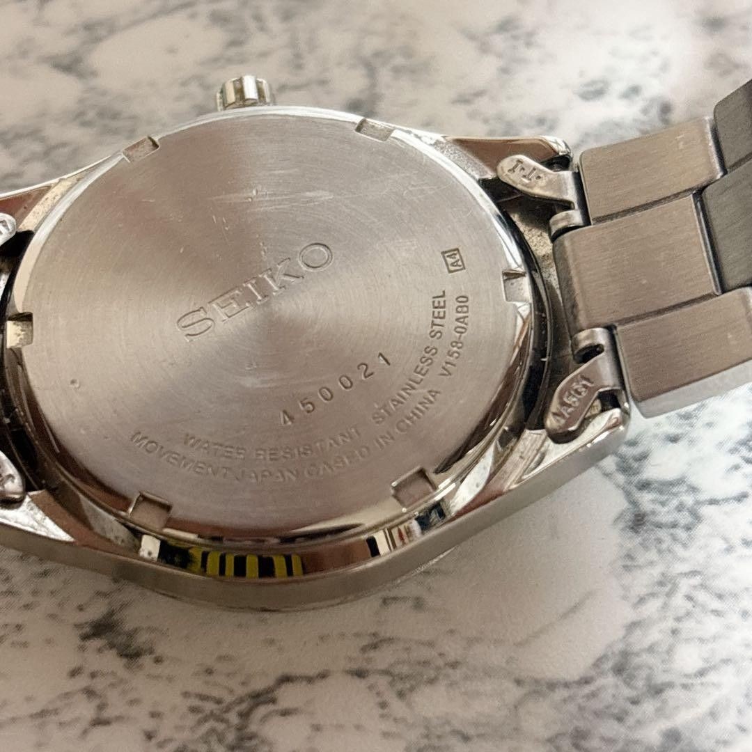 SEIKO V158 0AB0 men’s solar day date wristwatch working excellent condition