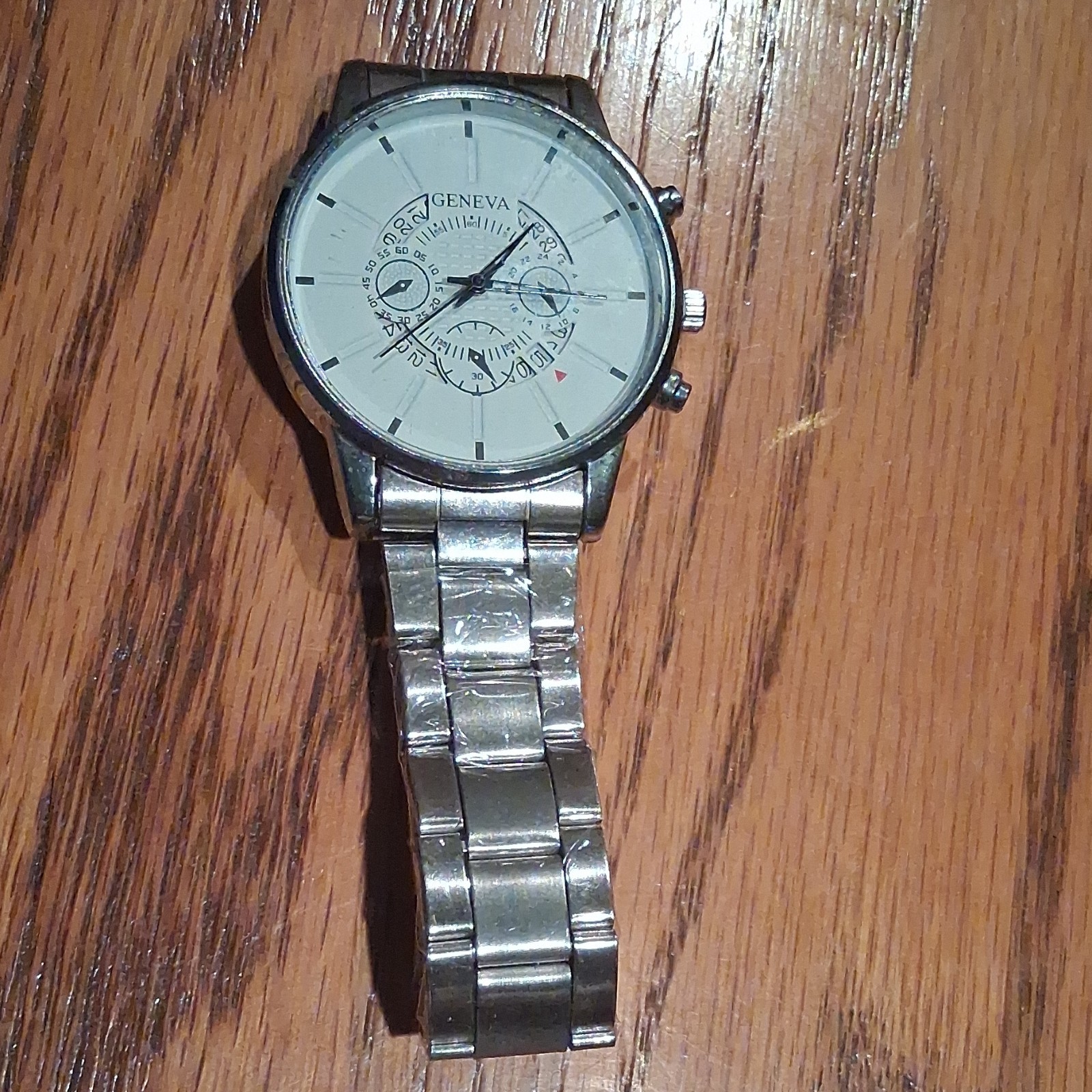 Geneva Men’s Analog Wristwatch Silver Metal Bracelet White Dial Baton Indexes