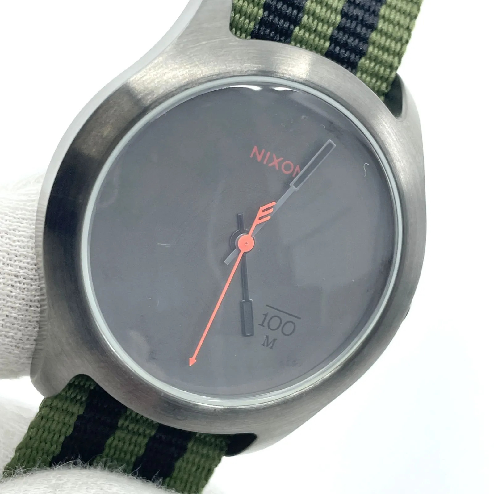 Working condition: NIXON The Quad quartz watch, nylon strap, gray dial.