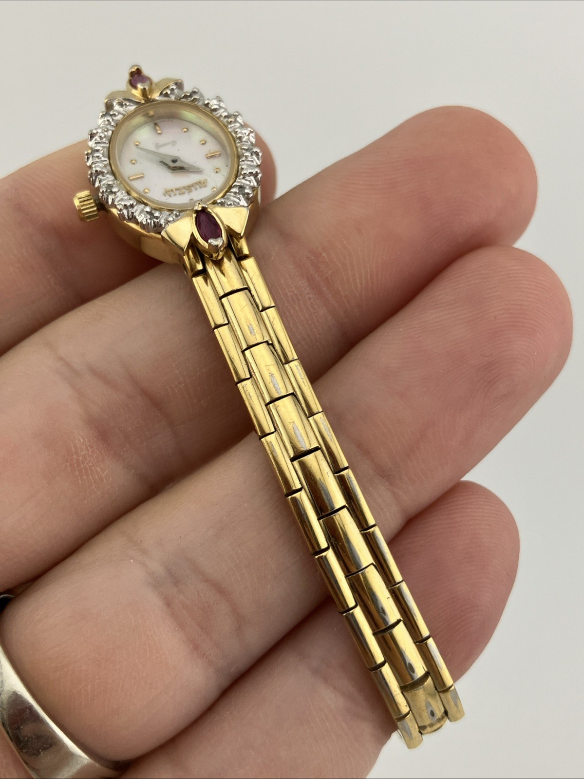 Vtg Austin Lades 17mm Watch Gold Tone Diamond & Ruby Bezel MOP Dial 5.75″ – RUNS