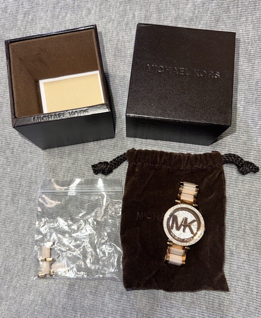 Michael Kors Women’s Quartz Logo Dial Diamond Accent Pink/Gold Bracelet Watch