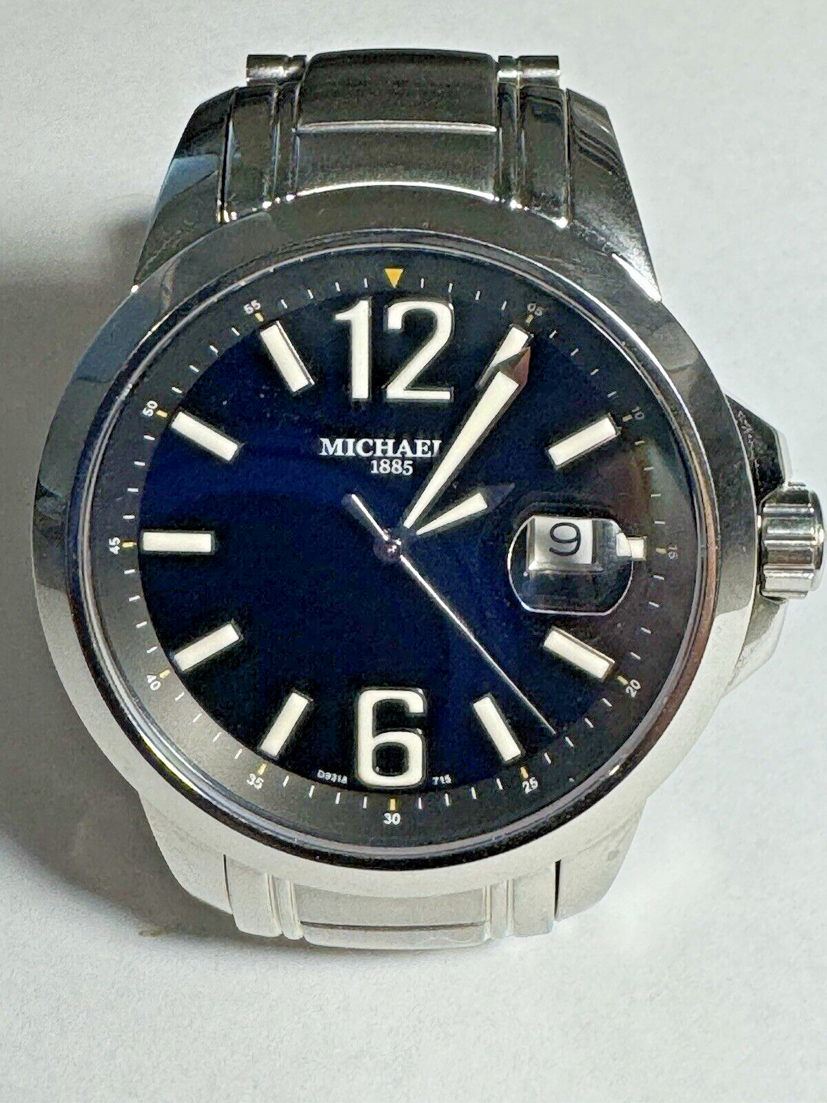Michaels men’s stainless steel watch with screw down crown, sapphire crystal
