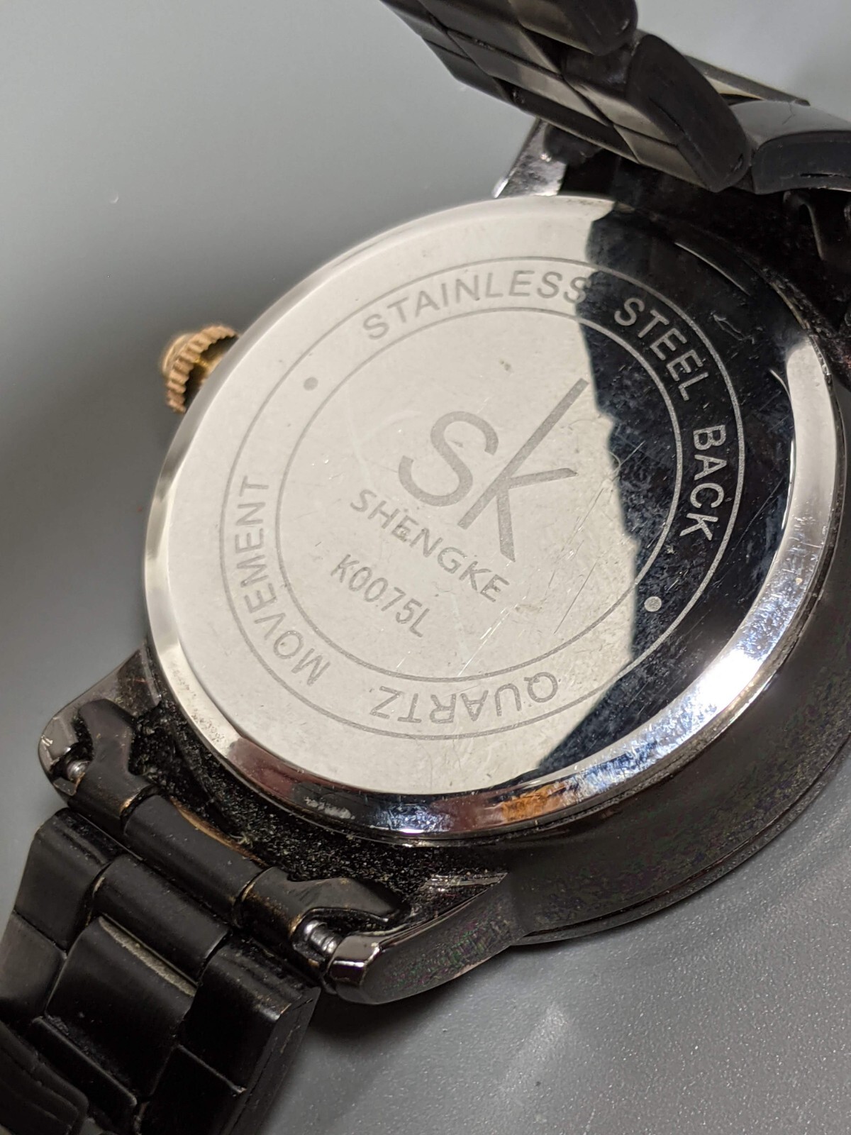 Shengke SK Womans Gunmetal Gray Gold Tone Crystal Accent Watch 6.75 in