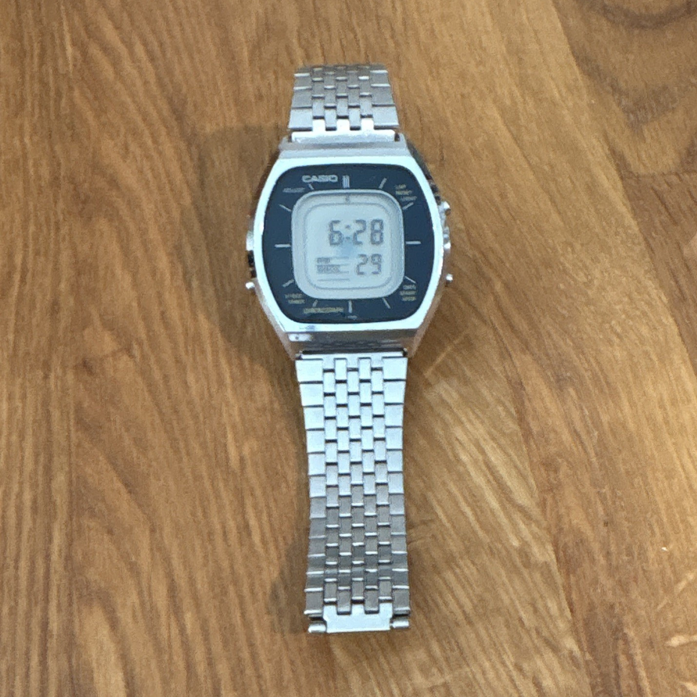 Casio 56QS-38 Digital Quartz Day/Date Square Watch, Silver Stainless Bracelet
