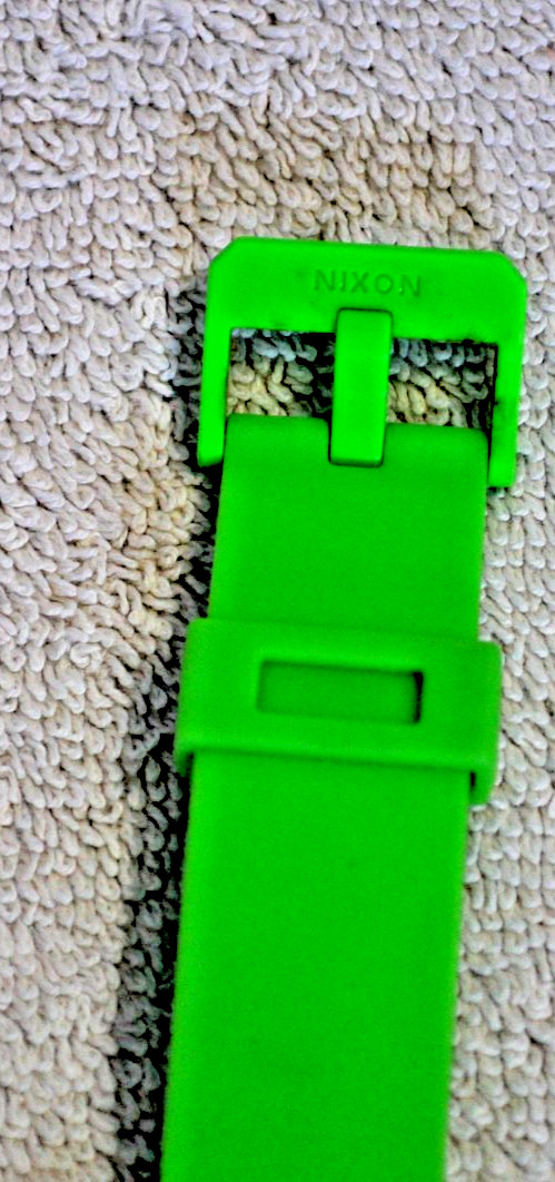 Nixon Time Teller P watch featuring a vibrant green polycarbonate case and strap