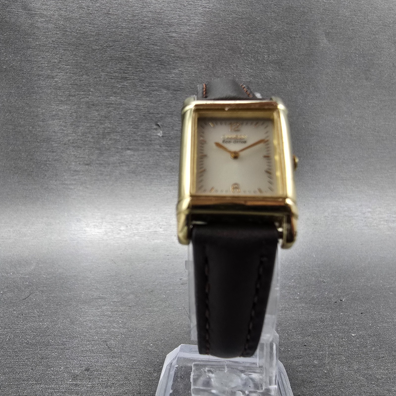 Citizen Eco-Drive Tank Watch Women 18mm Champagne Dial Gold Tone Rectangle Runs