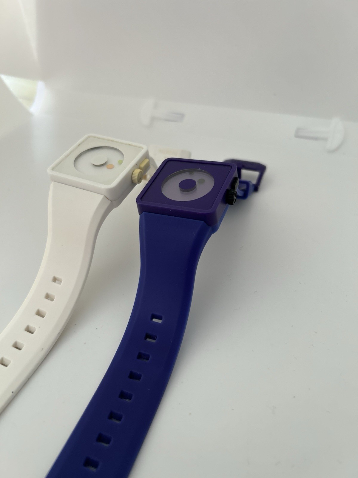 Two Nixon Float On The Newton Watch Purple And Blue And White
