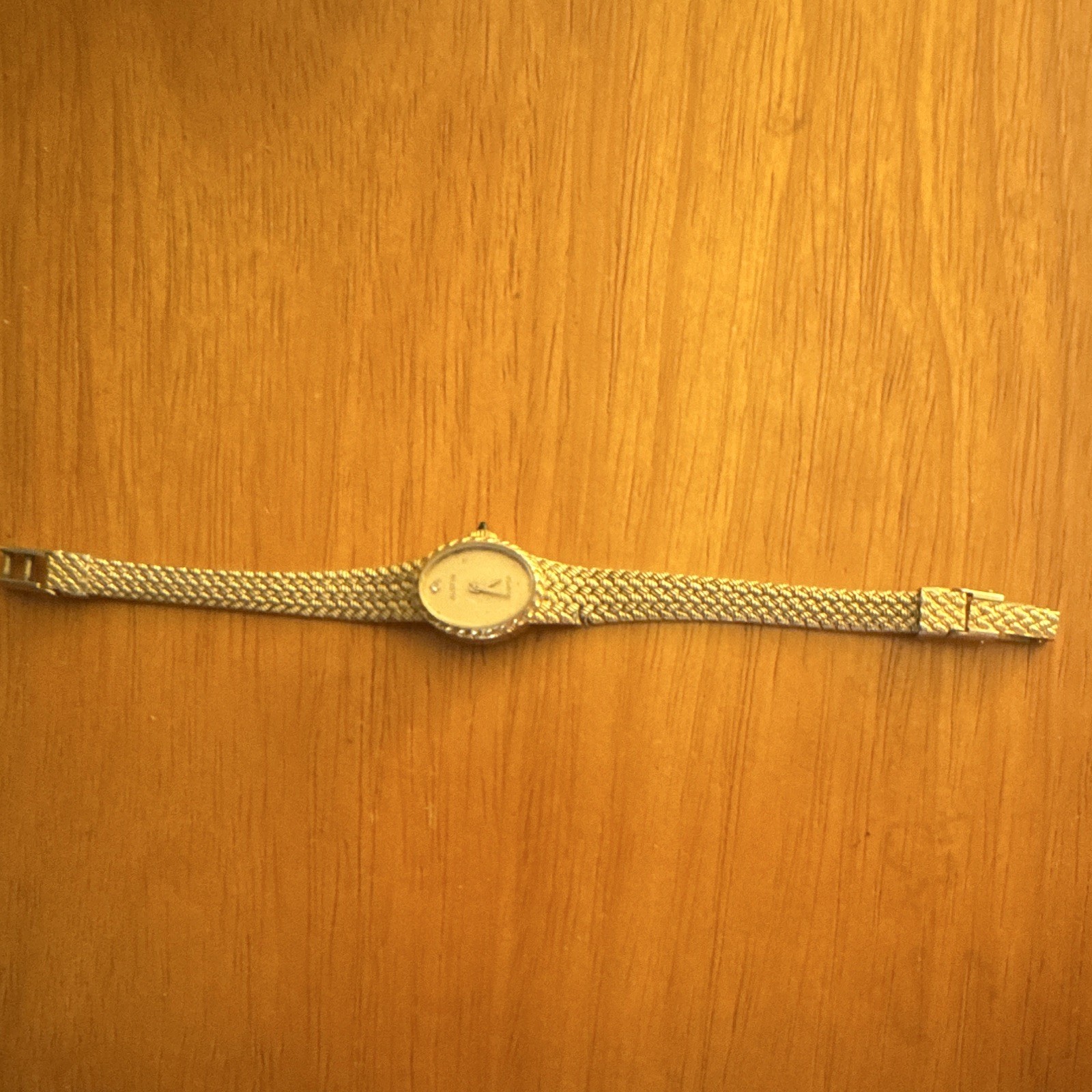 Austin Quartz Women’s Oval Gold-Tone Analog Bracelet Wristwatch