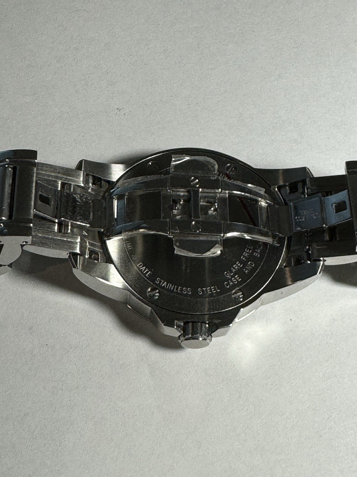 Michaels men’s stainless steel watch with screw down crown, sapphire crystal