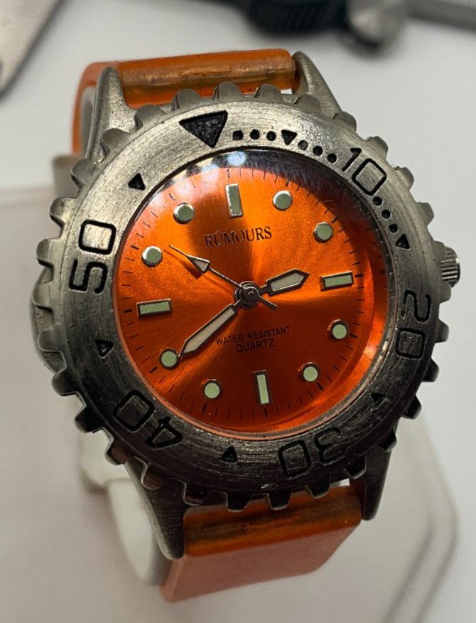 Rarely worn if ever, Rumours womens dive style watch, bold model, new battery