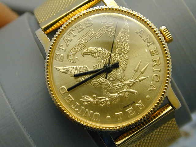 HONG KONG MADE US $10 GOLD COIN STYLE WIND UP PIN LEVER WRIST WATCH