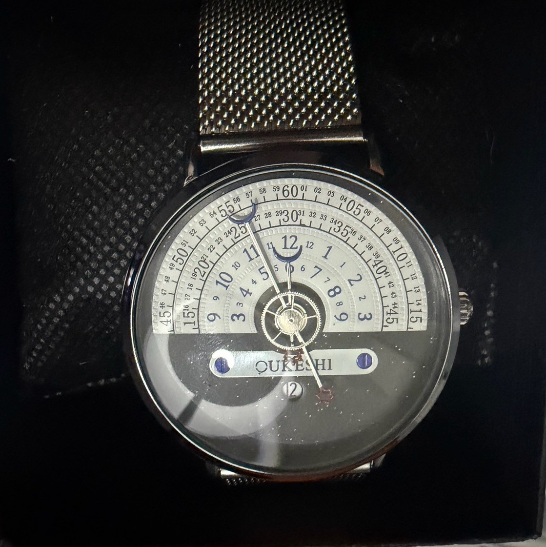 OUKESHI Orbit Dial Quartz Watch Mens Moon and Stars Pointer Steel Mesh Band