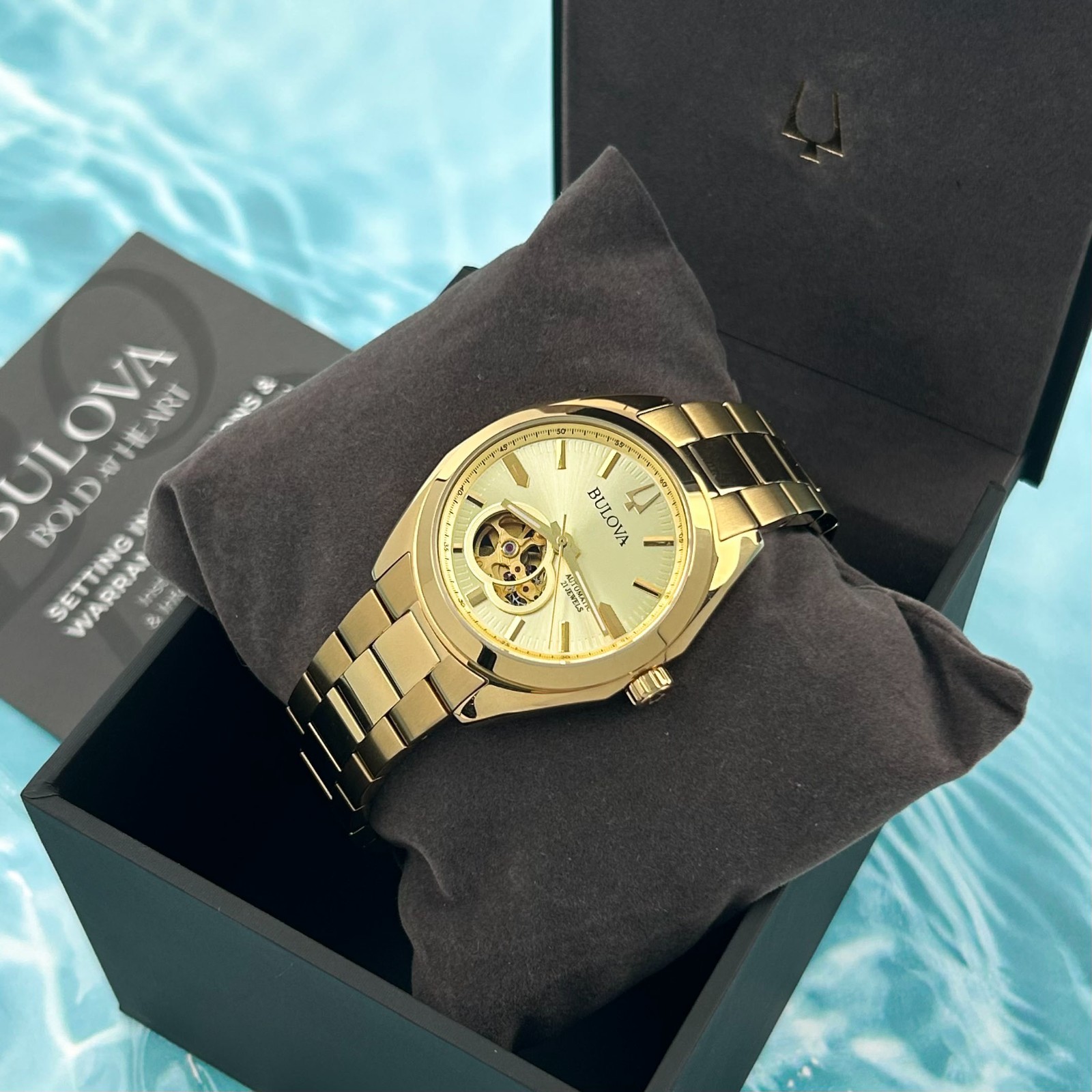 Bulova Men’s 97A182 Surveyor Champagne Dial Gold Automatic Automatic Watch 39MM