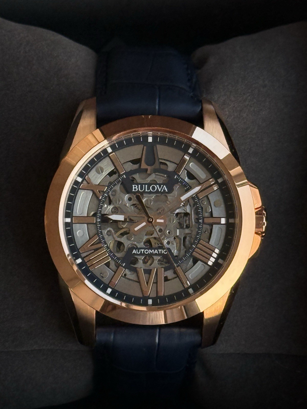 Bulova Sutton Men’s 43mm Automatic Skeleton Dial Rose Gold/Blue Leather w/ Box