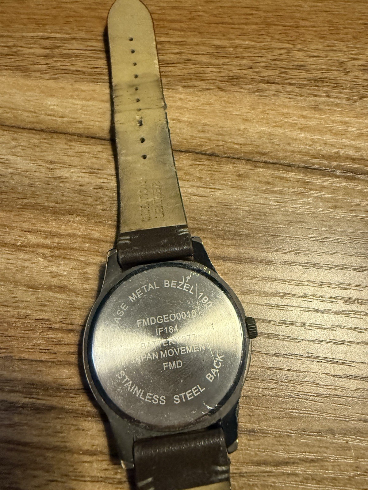 Analog Wristwatch White Dial Arabic Numerals Brown Leather Strap Black Case